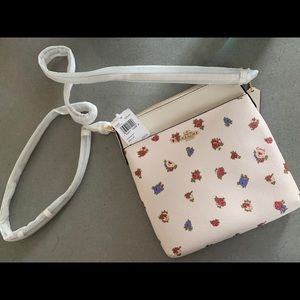 Coach messenger crossbody w/ vintage floral print